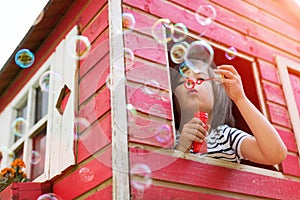 Boy blowing bubbles