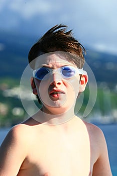 Boy in blue goggles