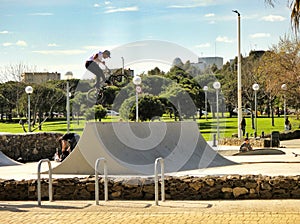 Boy on a bmx/mountain bike jumping in Barcelona, Spain