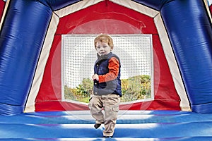 Boy in bounce house