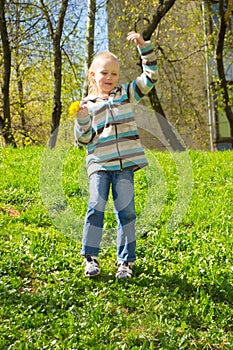 Boy with a bouquet of dandelions