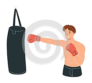 Boy boxer with big bags of sand Boxing, exercising. Fitness, sport, exercise, will power and the