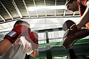 Boy Boxing Training Punch Mitts Exercise Concept