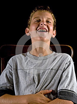 Boy with braces, laughing