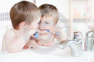 Boy brushing teeth