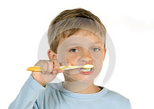 Boy brushing teeth
