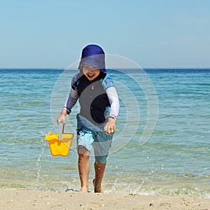 Boy with bucket