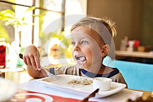 Boy in cafe