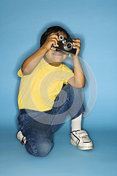 Boy with camera.