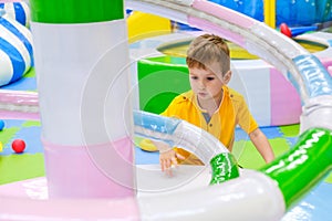 Boy carousel child fun kid. outdoors