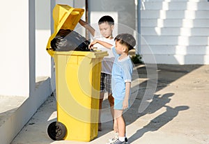 Boy carry garbage