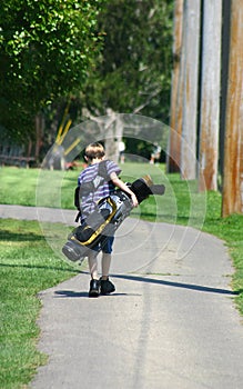 Boy Carrying Bag