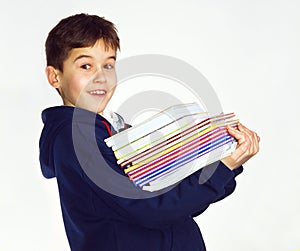 Boy carrying books photo