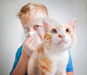 A boy with cat allergy