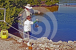 Boy catches fish