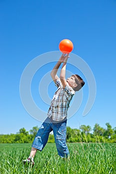Boy catching a ball