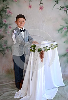 Boy celebrating his first holy communion