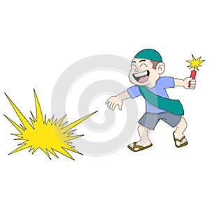 boy is celebrating Ramadan night playing firecrackers