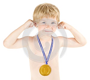 Boy champion with golden medal. Hands raised up