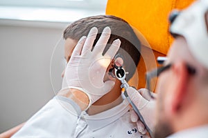 Boy at check-up at otolaryngologist