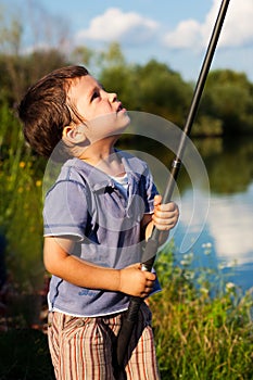 Boy checking rod