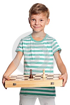 Boy with chessboard