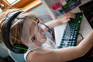 Boy with chickenpox playing video games