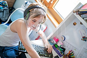 Boy with chickenpox playing video games