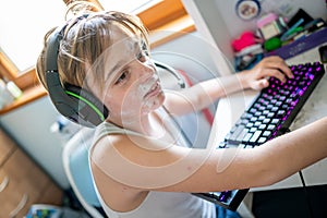 Boy with chickenpox playing video games