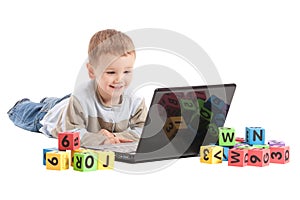 Boy child learning education on computer notebook