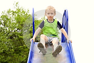 Boy Child playing in Park playground