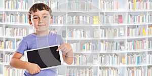Boy child pointing at tablet computer library banner information marketing ad advertising