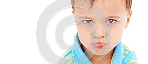 Boy child, sad and studio portrait with mockup space for mental health promotion by white background. Kid, face and