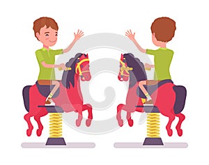 Boy child 7-9 yo school age kid at horse spring rider