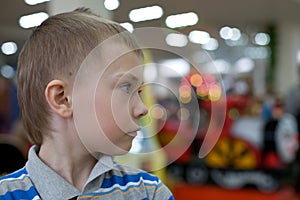 Boy in the children's amusement arcade