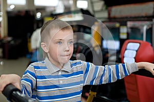 Boy in the children's amusement arcade