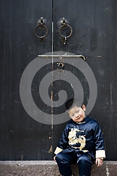 A boy in chinese traditional costume