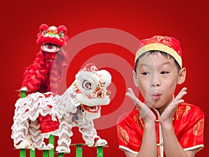 Boy with Chinese traditional dress exciting