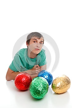 Boy with chocolate easter eggs