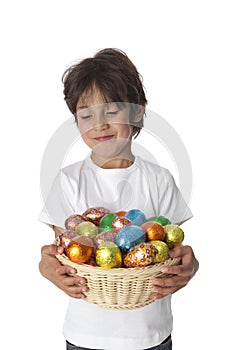 Boy with chocolate Easter eggs