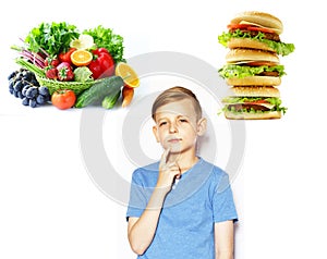 Boy chooses between healthy food and fast food