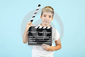 Boy with clapper board