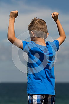 Boy with clenched fists