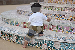 Boy climb on stairs