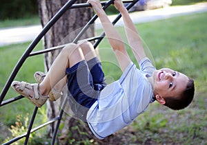 Boy on a climbing frame