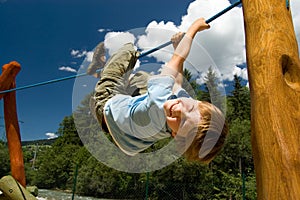 Boy on a climbing rope