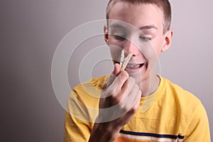 Boy with Clothespin