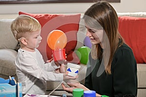 A Boy With Cochlear Implants Playing photo