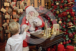 A Boy with Cochlear Implants and Santa Claus