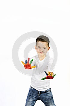 Boy with colorful painted hands